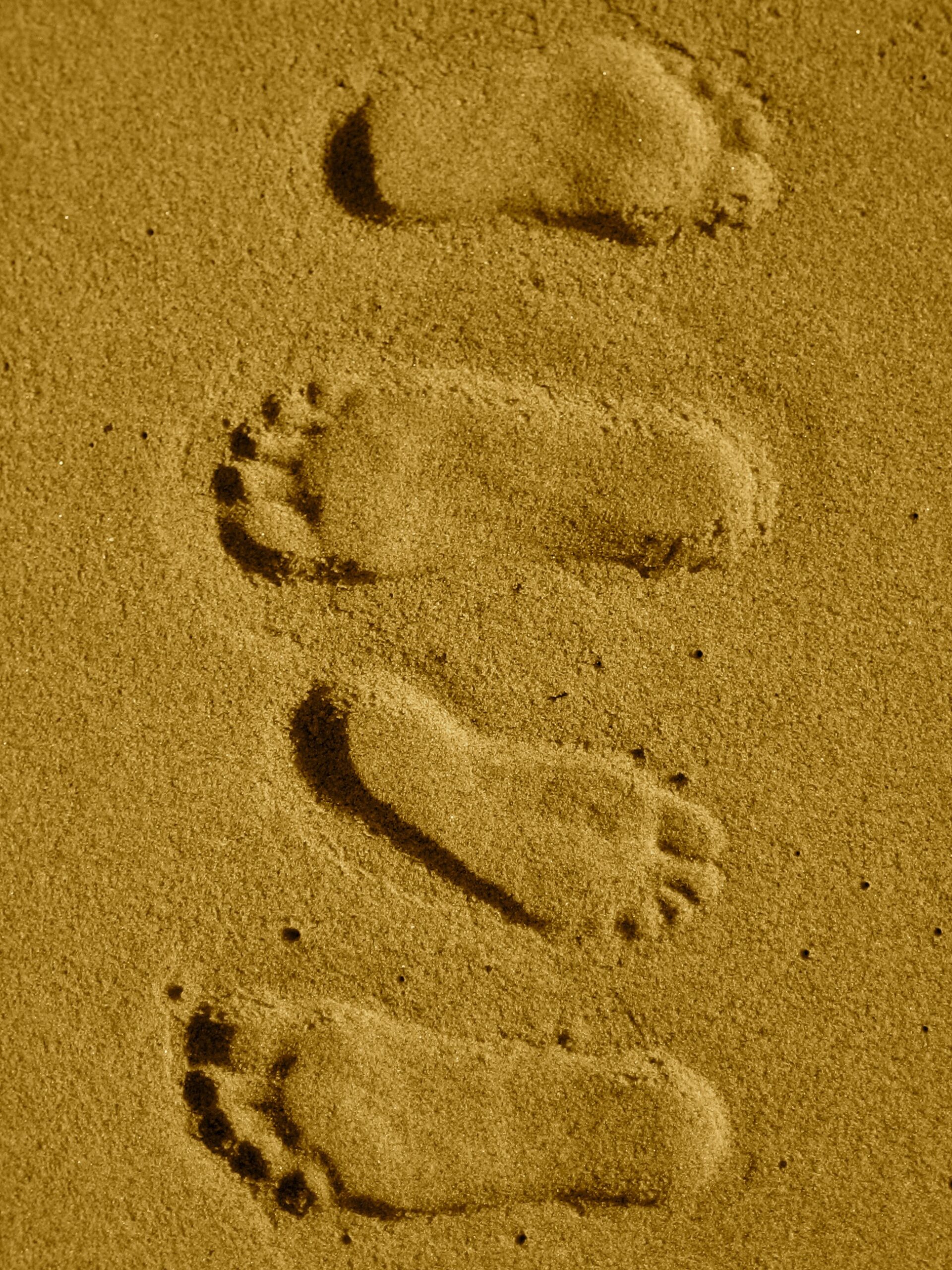 empreintes de pied sur le sable
